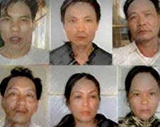 Vietnam court frees two defendants 