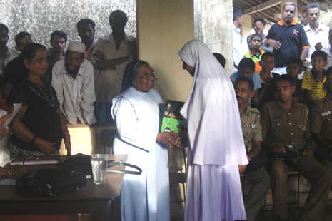 Students receive solar lamps