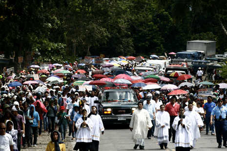 Slain priest laid to rest