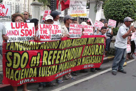 Court orders Aquino land distribution