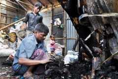 Slum blaze kills 11