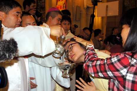 Why are most of China's Easter baptisms adult?