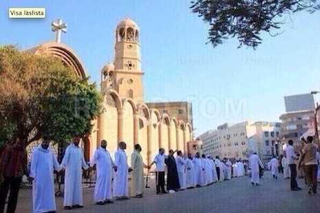 Viral photo shows Muslims defending Catholic church in Egypt