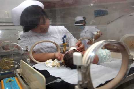 New centers for abandoned babies spark debate in China