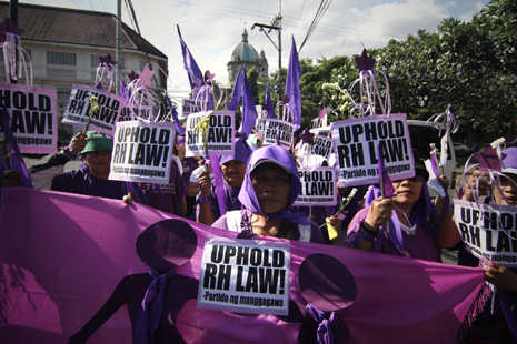 Philippine women march for Reproductive Health Law