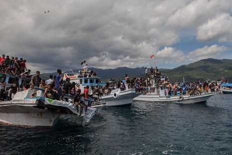 Boat capsizes during Indonesian Holy Week procession