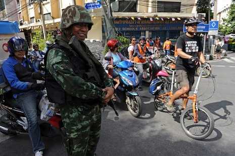 Thailand's new military rulers threaten to ban social media critics 
