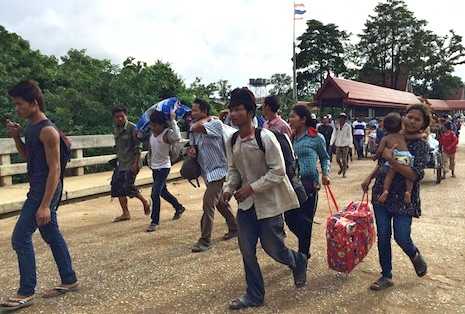 Cambodian exodus from Thailand becomes a stampede