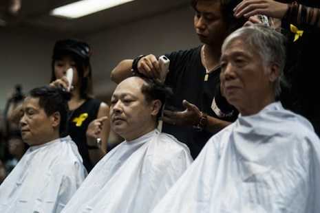 Hong Kong pro-democracy leaders shave heads in protest
