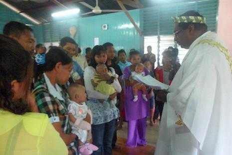 Malaysia police return seized hymnals to Catholic priest