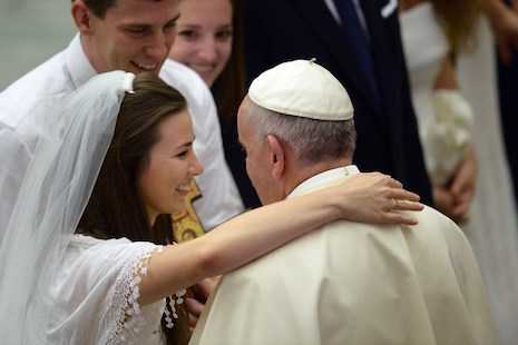 Divorced and remarried Catholics are not excommunicated, pope says