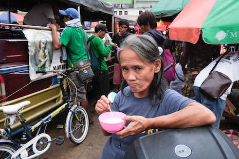 Manila's homeless go hungry amid Christmas feasting