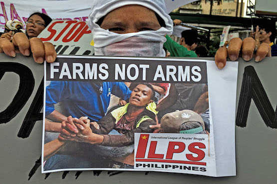 Philippine police disperse, shoot at protesting farmers