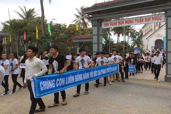 Catholics in Vietnam march to protect environment