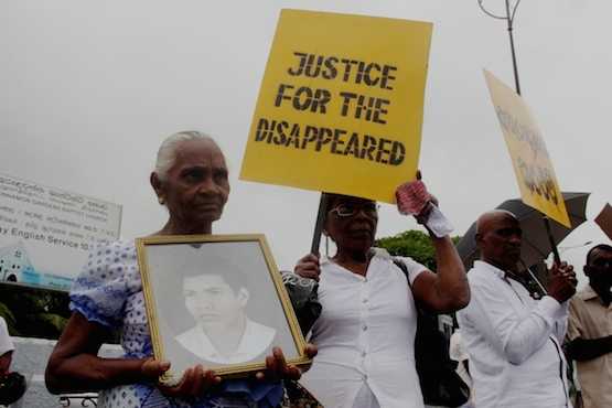 Relatives of disappeared people march in Colombo