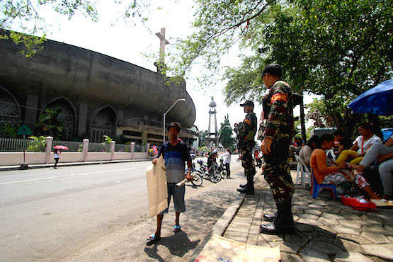 Churches tighten security after deadly Philippine blast