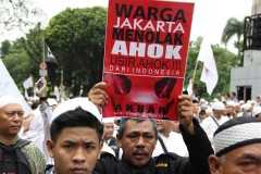 Hardliners demand death over Jakarta governor's alleged blasphemy