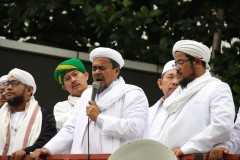 Indonesian police charge hard-line cleric 