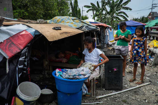 Manila prelate calls for end to dole-out program for poor