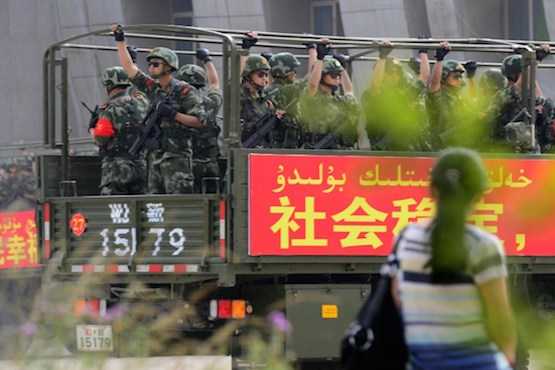 Muslim Uyghurs warned by Chinese show of force in Xinjiang