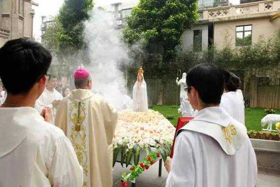 our lady of china: Chinese Catholics celebrate double Marian feasts