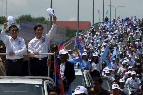 Cambodians go to the polls amid crackdown on dissent