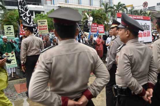 Widodo issues decree allowing the banning of radical groups