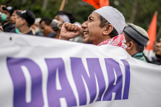 Indonesia disbands hard-line Muslim group