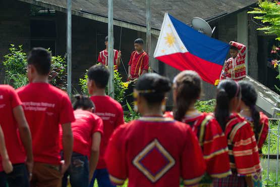 Threatened children hold classes in Manila refugee school