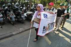 Disabled in Jakarta demand accessible sidewalks