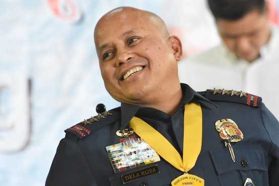 Philippine police chief Bible bashes church leaders 