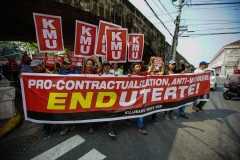 Rival Philippine labor groups unite against Duterte