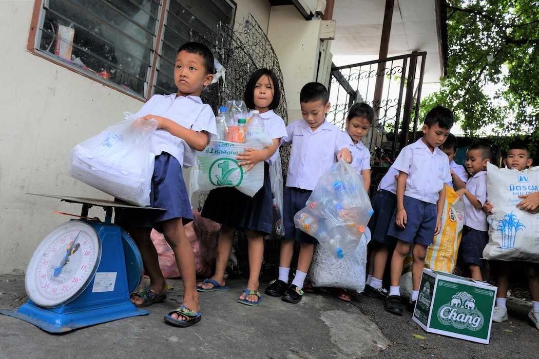 Children chip away at Thailand's plastic waste mountain
