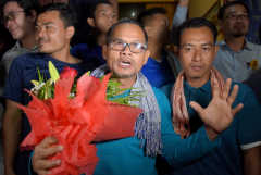 Cambodia eases pressure by releasing political prisoners