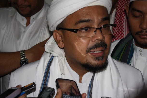 Return of fugitive Indonesian cleric backed by hardliners