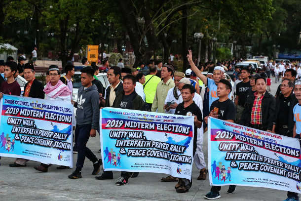 Filipinos hold pre-poll prayer rally, unity walk
