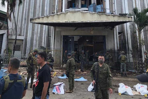 Philippine cathedral blasts kill at least 20, injures 100