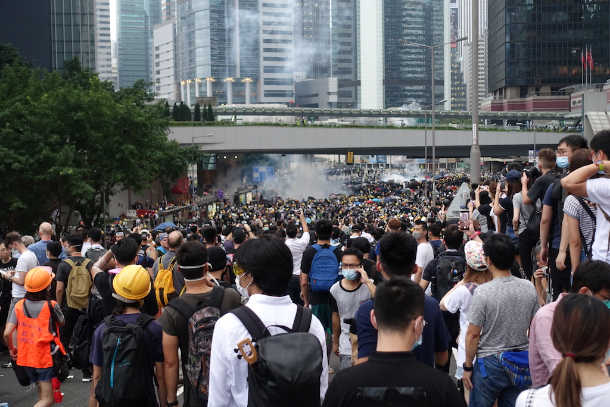 Mass held after Hong Kong protest turns violent