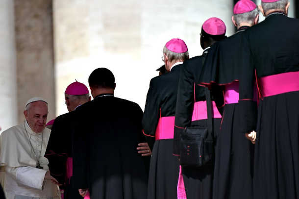 Roll up your sleeves, get ready to get dirty, pope tells new bishops