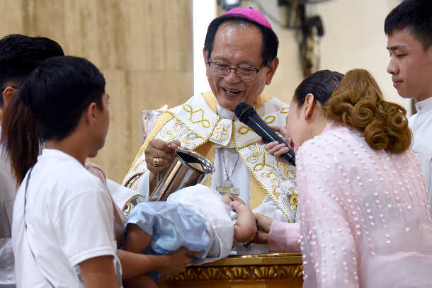 Baptism Ceremony Of Faithful Of The Evangelical Baptist Church In