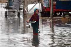 Pakistan sinks in record rainfall, urban flooding