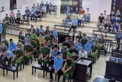 Call to suspend murder trial of Vietnam farmers