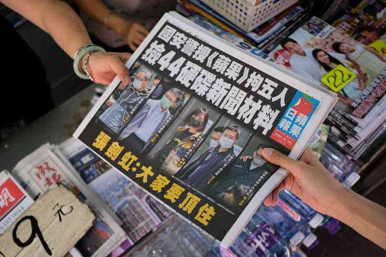 Hong Kong Democracy Paper Defiant As Executives Charged Under Security