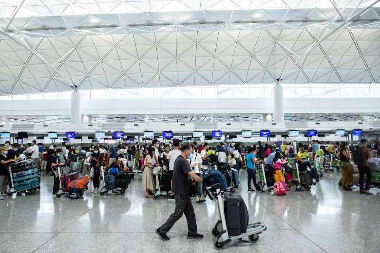 Airport echoes with sobs and farewells in Hong Kong exodus