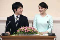 Japan princess to wed, reject payout after controversy