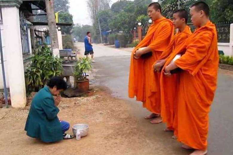 Partying Thai monks defrocked for flouting Covid-19 rules