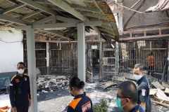 Indonesia charges three prison officers over deadly fire
