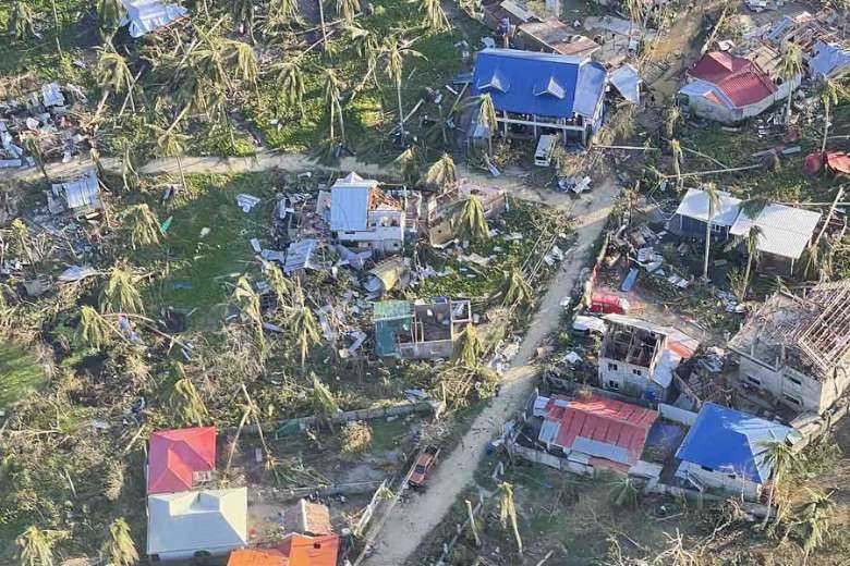 Death toll rises to 18 as typhoon pummels Philippines