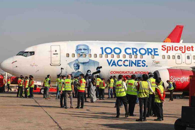 Indian man fined for wanting Modi's face cut from vaccine drive