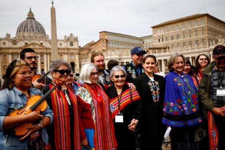 Indigenous Canadians give pope moccasins, ask him to walk with them